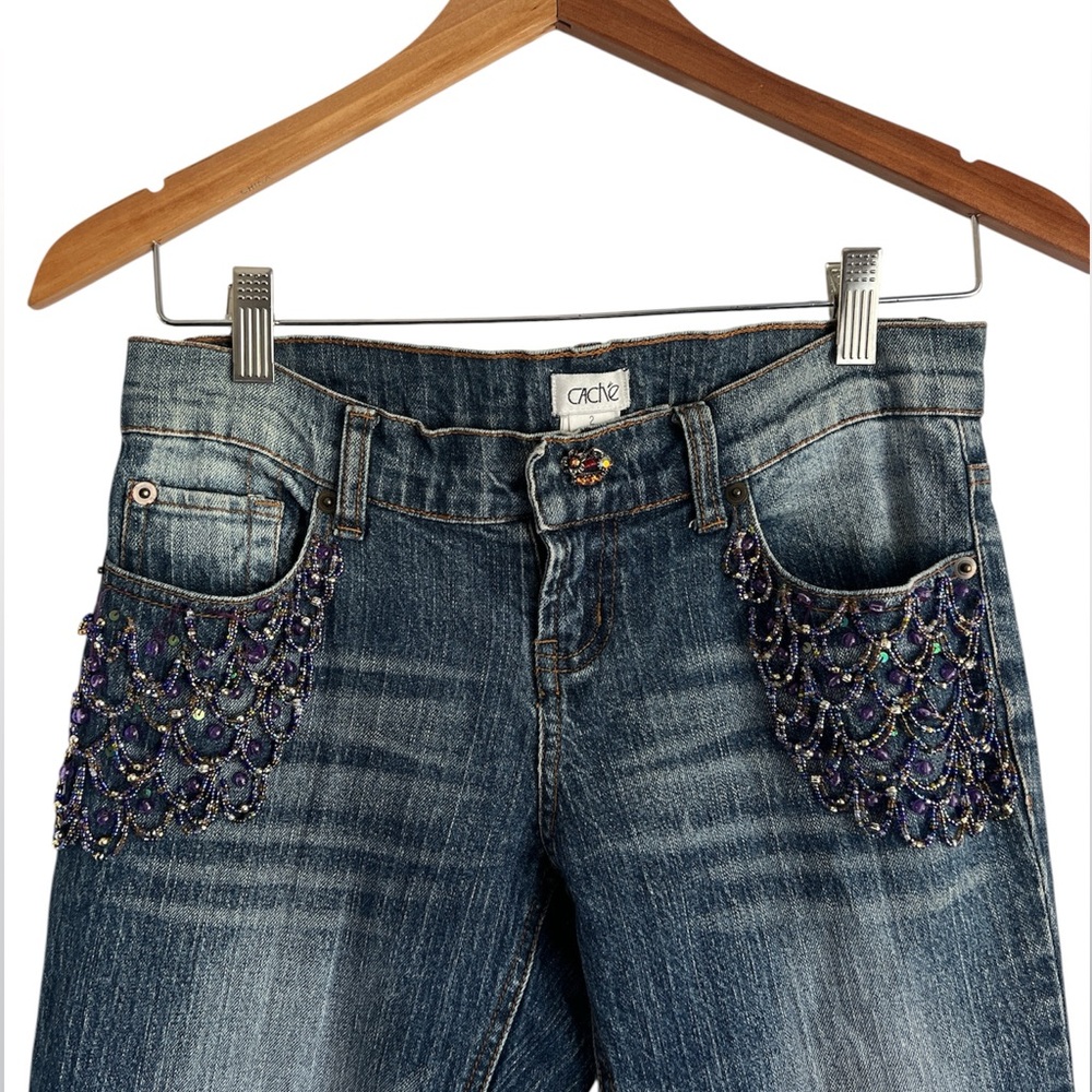 Vintage Cache Low Rise Boot Cut Jeans with
Embellished Pockets